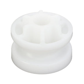 The AGCO | Pulley, Tensioner - 4349926M2, a white plastic spool featuring a hollow center and multiple radial supports, is ideal for use with Massey Ferguson models.
