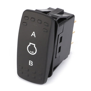 The AGCO Switch, Rocker - 4290444M2, a black rocker switch with "A" and "B" labeled and a headlight symbol in the center, featuring copper connectors—perfect for Fendt or Massey Ferguson equipment.