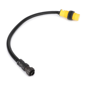 Coiled black cable with connectors on both ends, featuring a distinctive yellow terminal on one end; AGCO | WARN INDICATOR - D28780531 by AGCO.