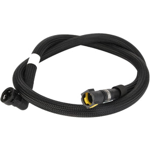 Introducing the AGCO Fuel Hose - Acw0701950, a sleek, coiled black braided cable equipped with connectors on both ends, featuring a sturdy black socket and a distinctive yellow-tipped plug.