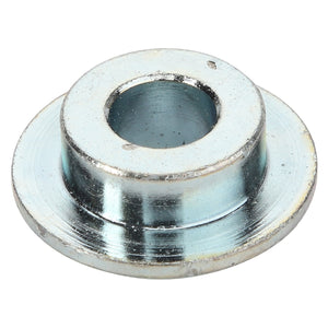 The AGCO | BUSH - D49073400 by AGCO is a metal spacer featuring a central hole and a wider base, commonly used in mechanical assemblies for aligning or spacing components.