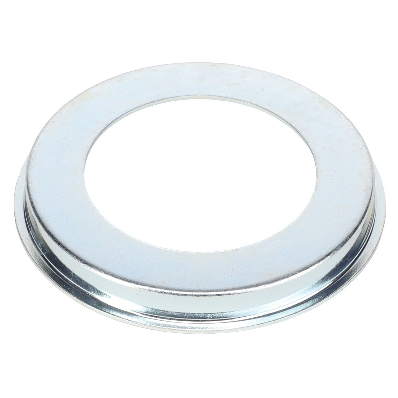 The AGCO | Seal - Acp0000220 is a metallic round washer with a central hole, featuring a slightly raised edge around its outer rim.