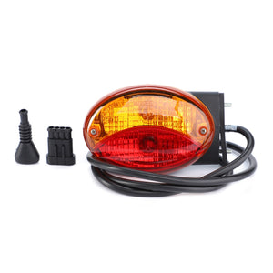 The AGCO Combination Light for the rear right side (Acp0329330), an oval-shaped amber and red taillight with attached wiring, black connector, and rubber boot laid out on a white background, showcases durable quality for optimal illumination as an example of AGCO Genuine Lighting Parts.