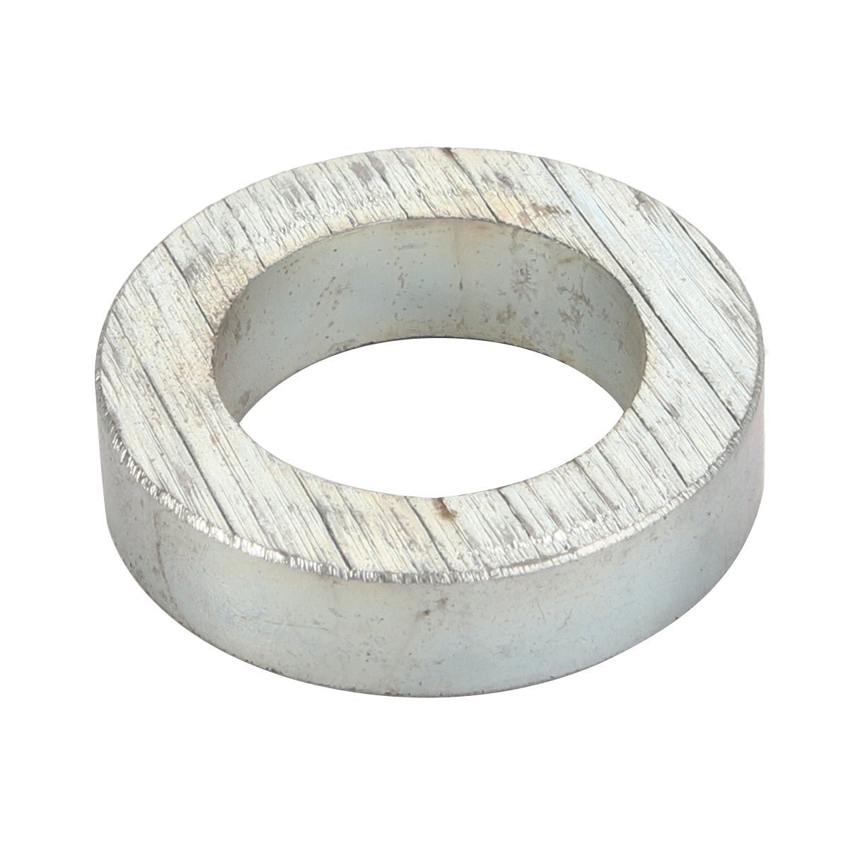 A silver metal washer with a large central hole, displaying some scratches and wear on its surface. No current product description available for AGCO | Spacer - Acp0005780 by AGCO.