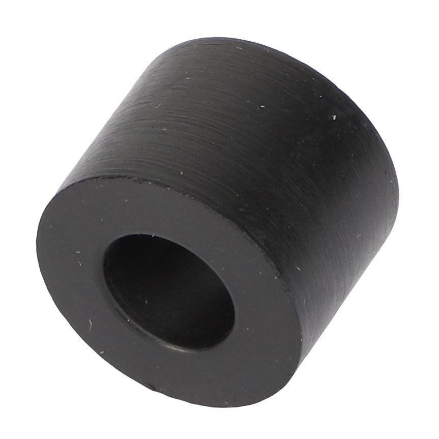 A black cylindrical plastic spacer with a hole through the center, shown against a white background. Product Name: AGCO | SUPPORT - AL5215150 by AGCO.