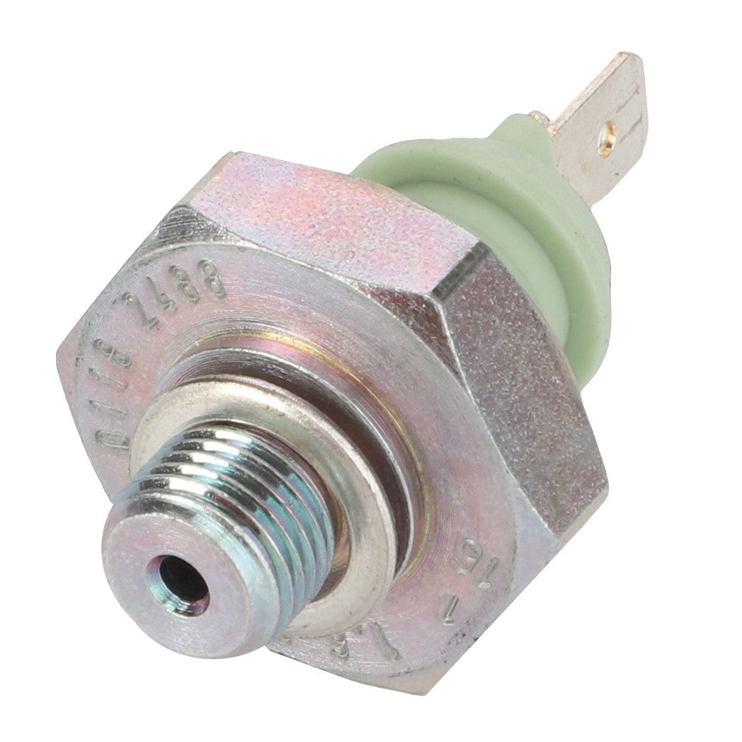 Close-up of an AGCO Oil Pressure Sensor - F007201510042, featuring metal and plastic components with threaded and flat connectors, likely used for monitoring oil pressure in a vehicle system. No product description available.