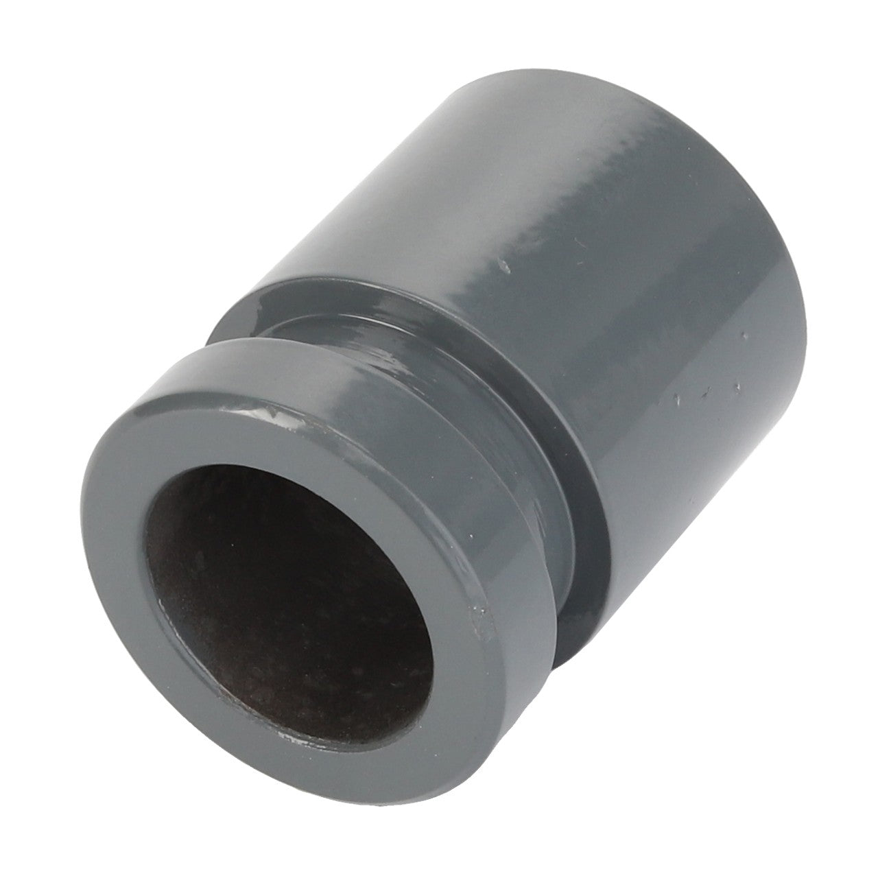 This product is the AGCO | BUSH - D28585136 from the AGCO brand, a grey cylindrical plastic pipe connector with one slightly wider end and a smaller open end. Additional specifications are currently not available.