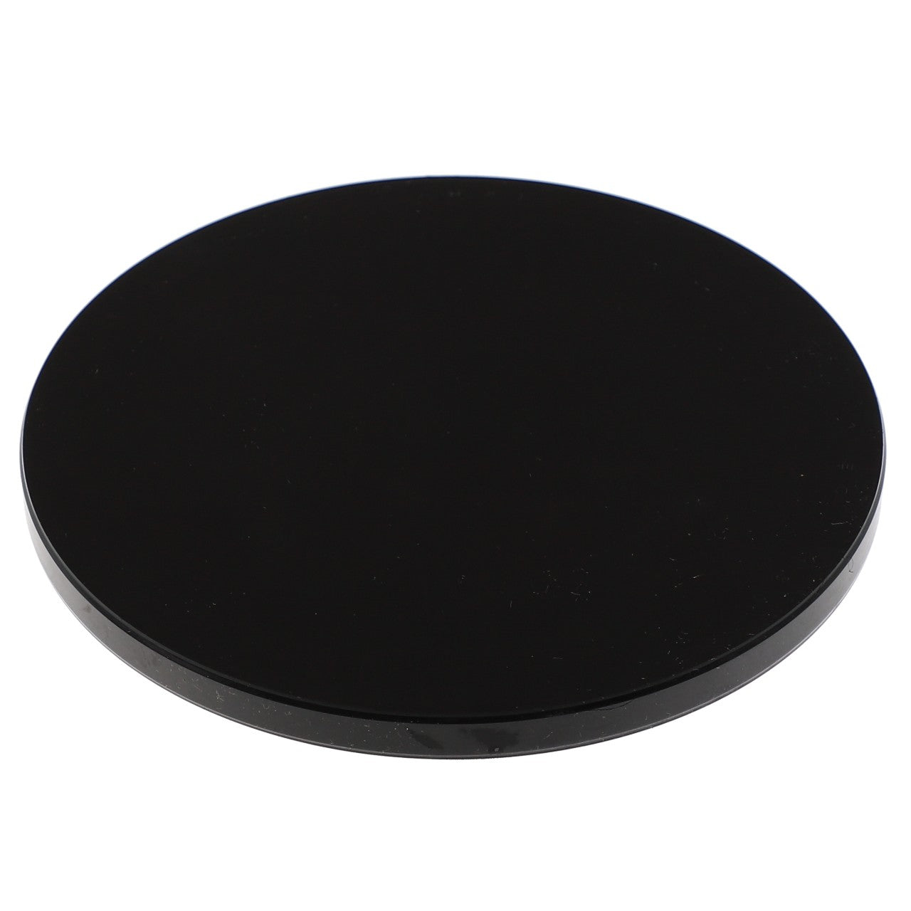 A sleek, black AGCO Cap - Acp0557640 with a smooth surface lies against a stark white background, presenting a striking contrast.