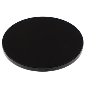 A sleek, black AGCO Cap - Acp0557640 with a smooth surface lies against a stark white background, presenting a striking contrast.