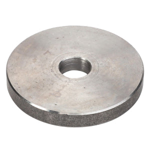 The AGCO | DISC - D26733797 is a circular metal disc featuring a central hole, similar in appearance to a washer.