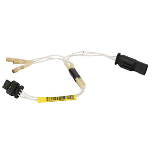 The AGCO Harness - Act0012410 by AGCO includes white wires and black connectors on each end, along with a labeled yellow bar code tag.