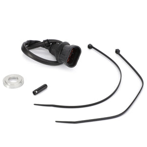 The AGCO Kit, Harness - 3909600M91 includes a black electric connector with attached wires, two cable ties, a small cylindrical piece, and a round metallic component, all arranged on a white background and ideal for Massey Ferguson Models.