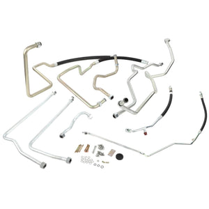 AGCO's Kit, Cooling - Acp0299220, consisting of assorted metal and rubber automotive tubing and fittings, is arranged on a white background. The kit features various connectors, bolts, screws, and precision-engineered components.