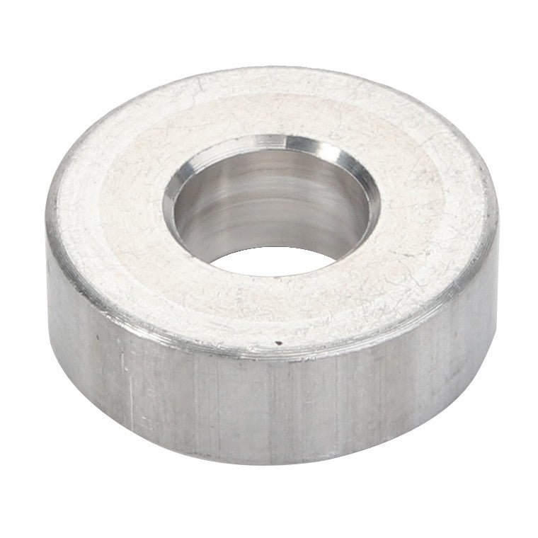 The AGCO Spacer - Acp0246550 is a metallic silver washer featuring a smooth surface and a central circular hole. Currently, no further product description is available.