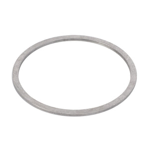 The AGCO Adjusting Shim - 4305566M1 is a metal ring characterized by its thin, flat design and smooth surface. It appears to be crafted from a sturdy material, likely steel or aluminum, echoing the robust durability typical of Massey Ferguson models. The shim is displayed against a plain white background.