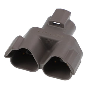 A close-up of a gray plastic AGCO | RECEPTACLE CONNECTOR - AG522411 featuring two slots and distinct ridges.