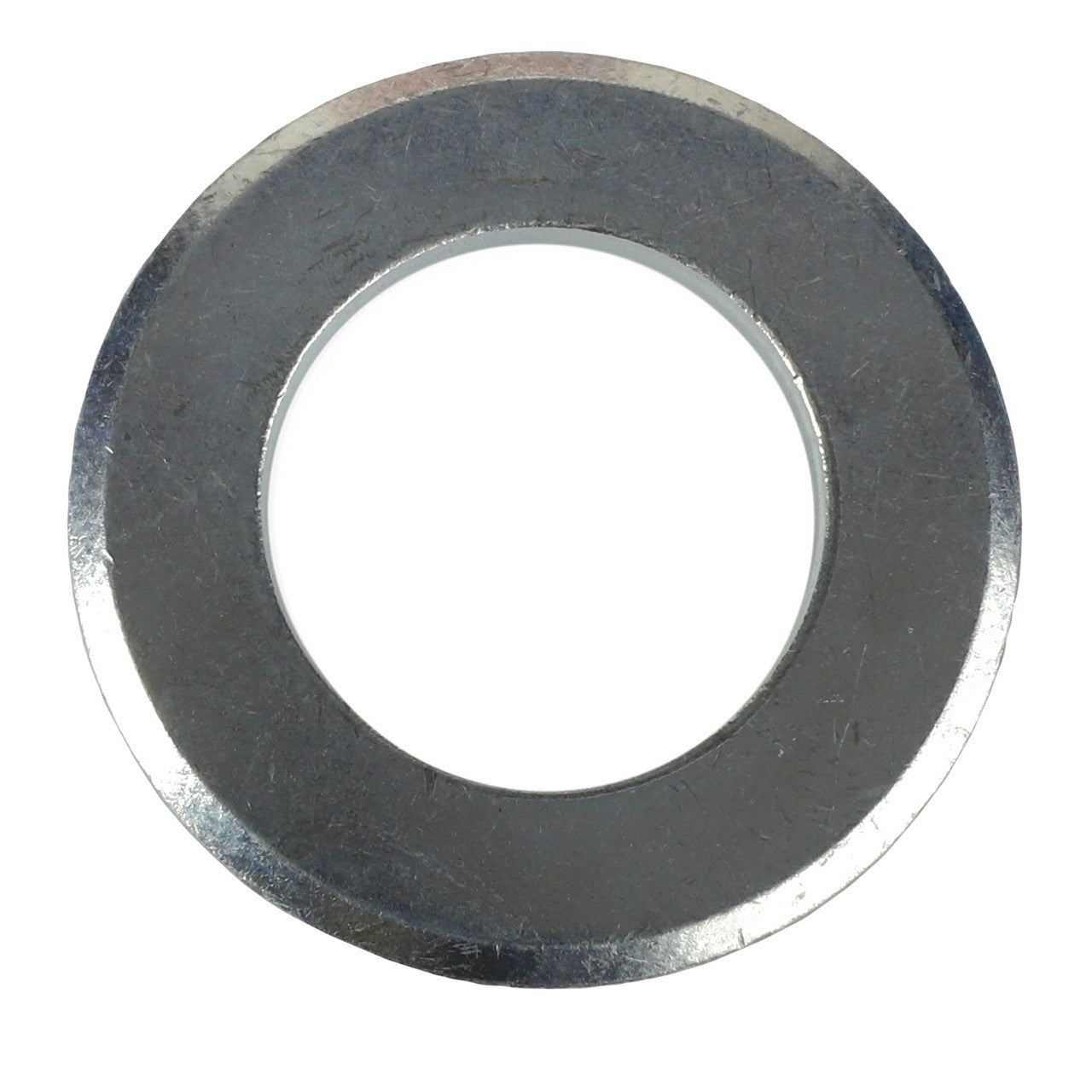 Close-up of the AGCO | WASHER - AL5013128, a metallic washer with a central hole designed for use as a fastening component in mechanical applications.