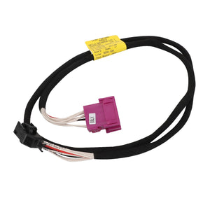 The AGCO Harness - Acw138345A is a black cable assembly featuring a purple rectangular connector on one end and a black rectangular connector on the other. A yellow label with text is attached to the cable, detailing crucial specifications and safety information.