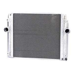 A durable engine part, this AGCO Radiator, No Cap - 4390452M1, features visible cooling fins and two inlet/outlet ports on the sides, perfect for various Massey Ferguson models.