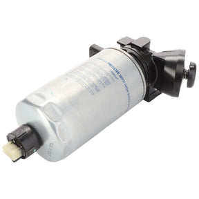 The AGCO Fuel Filter - LA323004750 is a cylindrical gas filter featuring a metallic body and black plastic components on both ends. It includes a connector and locking mechanism, specifically designed for Massey Ferguson tractor models such as the MF 7245.