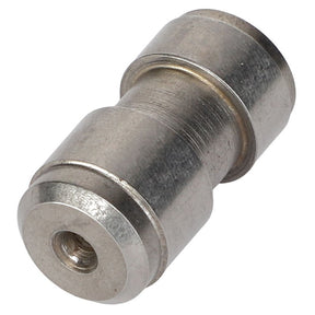 A metal cylindrical component with a central hole, viewed from an angle. This product is the AGCO POPPET - AG723972 manufactured by AGCO.