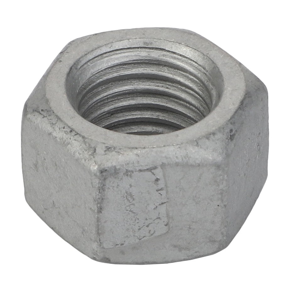 A close-up image of the AGCO Hex Nut - Acp0702750, a metallic hexagonal nut with an internal threaded hole, showcasing its precise engineering.