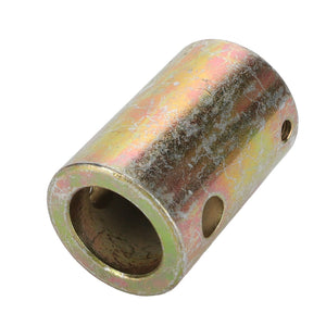 The AGCO ADAPTER - D28182364, a product by AGCO, is a cylindrical metal coupling with a yellowish, slightly rusted surface, featuring two large holes and two smaller ones. No current product description information is available.