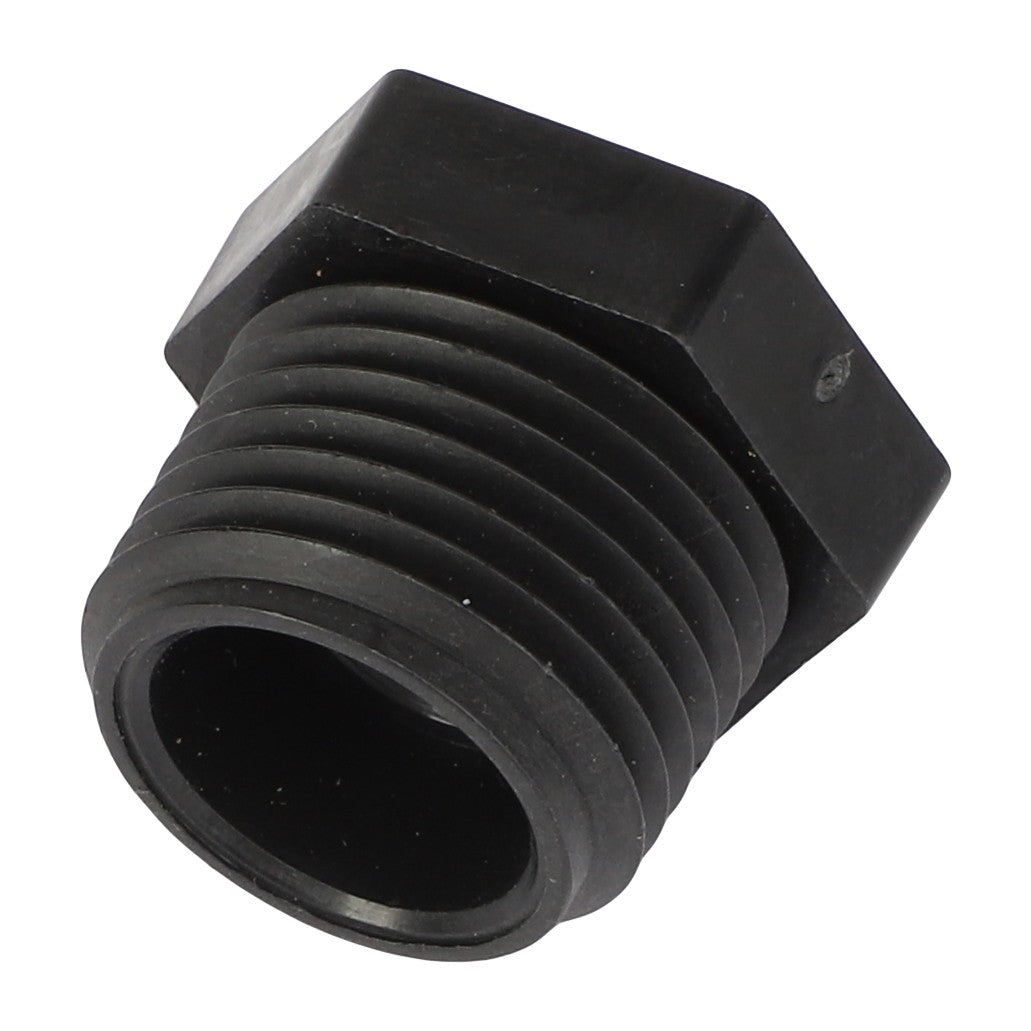 Close-up of the AGCO | REDUCER - AG610729, a cylindrical black threaded plastic plug with a hexagonal head, meticulously designed for sealing or capping a port or opening.