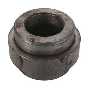 A close-up of the AGCO Bush - Acp0283720, a cylindrical metal bearing with a central hole, exhibiting signs of use and wear. No current product description available.