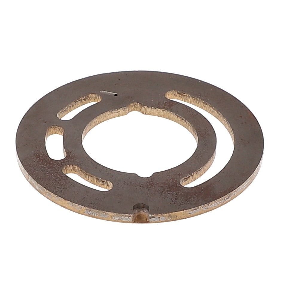 The AGCO | Distributor Plate - F412940010040, branded by AGCO, is a round, flat metal disk featuring cut-out patterns and a central hole, resembling a spacer or washer. No current product description available.