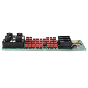 The AGCO | Circuit Board - H416900040062, showcasing precision engineering reminiscent of a Massey Ferguson tractor, features a green circuit board with various components including red rectangular capacitors, black connectors, and round black connectors arranged at one end.