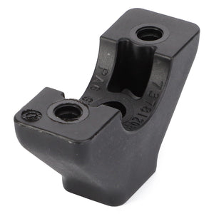 The AGCO | Unit Mount - 737812030600, a black plastic component featuring two holes for screws and embossed text and numbers on its surface, is potentially used for mechanical or structural purposes and may be compatible with Fendt Vario S4 systems.