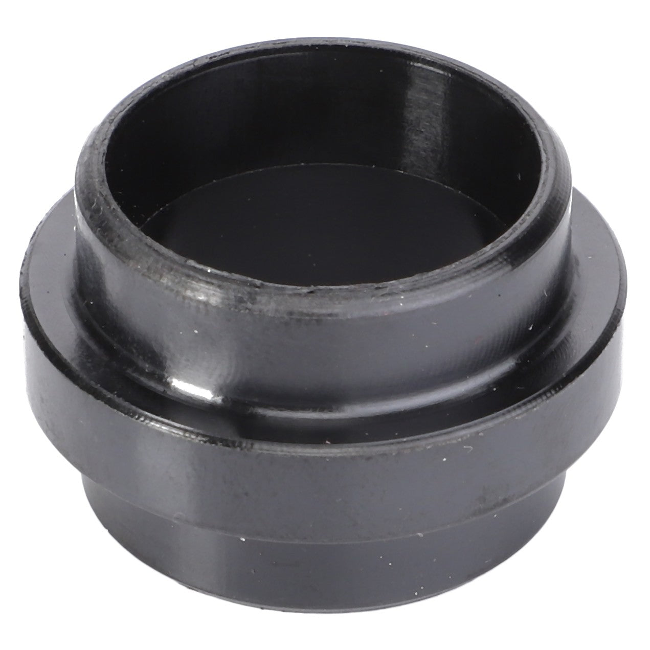 A black cylindrical metal or plastic component with a flanged base and a hollow center, commonly identified as the AGCO Water Pipe - V836873423, is often found in Fendt Vario machines.