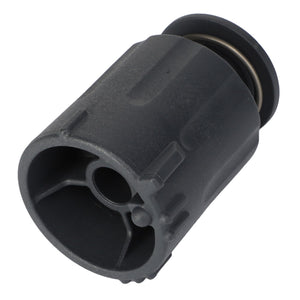 An AGCO KNOB - AL10550327 by AGCO is a cylindrical mechanical component with a dark finish, featuring a hollow interior, a central circular hole, and an outer rim with grooves.