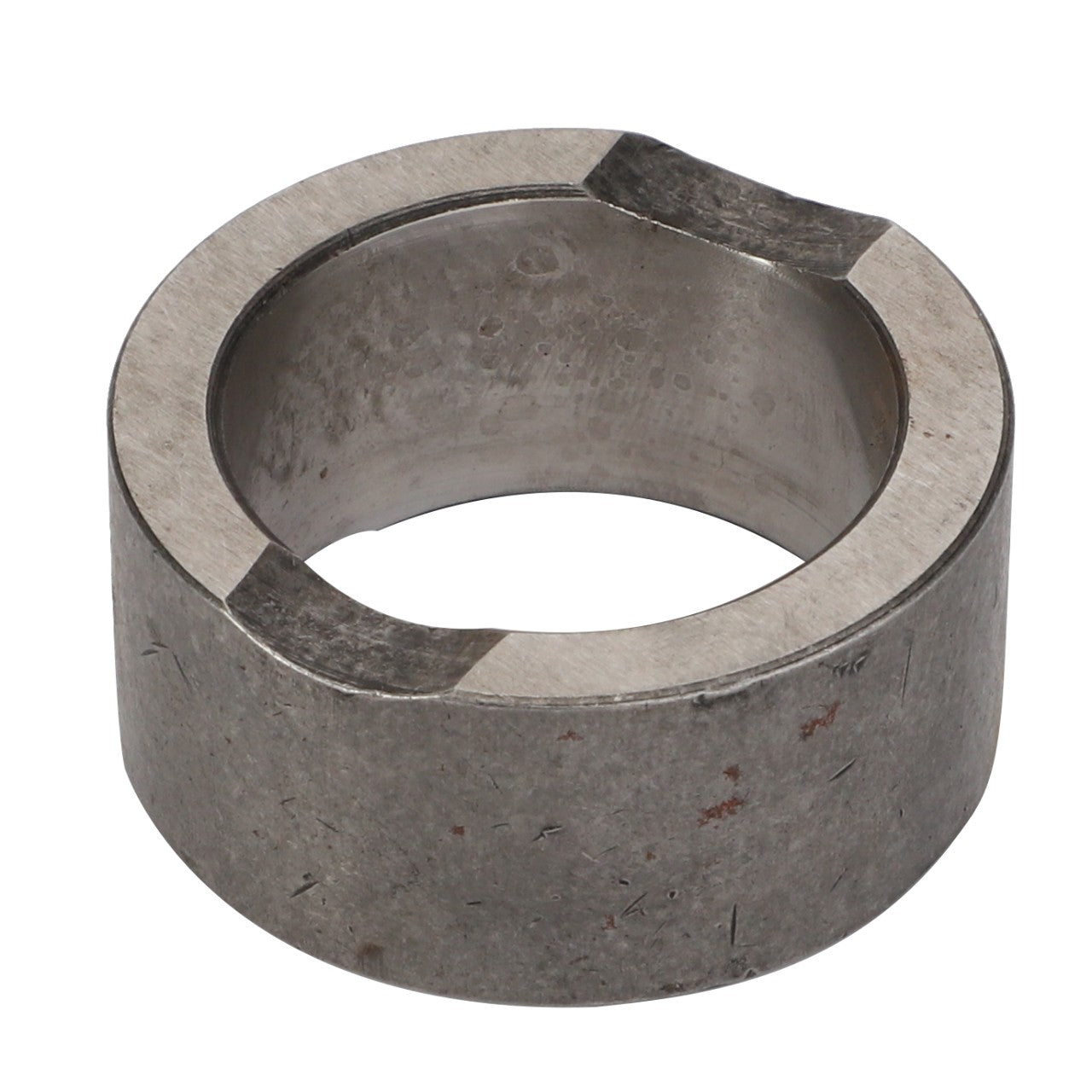 Close-up of the AGCO | Collar - Acp0137180, a cylindrical metal ring with a hollow center and two notches on the top edge. No current product description available.