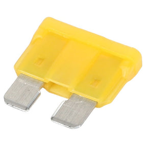 A close-up of the AGCO | FUSE 20A - AG562929, a yellow automotive blade fuse with two metal prongs.