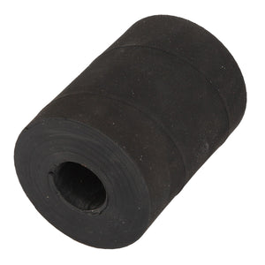 A cylindrical, black rubber roller with a hollow center, identified as the AGCO Bush - Acw497334A, is displayed on a white background. No additional product description information is available.