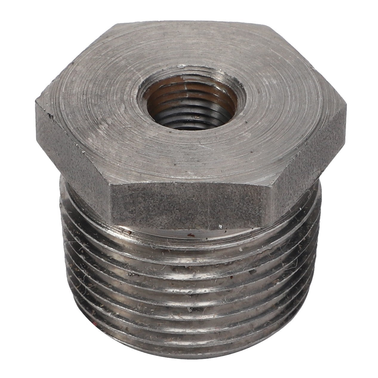 The AGCO | Reducer Bush - 803783 is a sturdy, hexagonal metal fitting that features threaded exterior and interior openings, making it ideal for plumbing or mechanical connections.