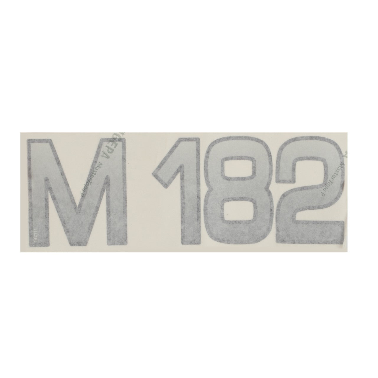 Clear film material displaying the text "M 182" in large outlined lettering. Product Name: AGCO | Decal - Fel142111, Brand Name: AGCO.