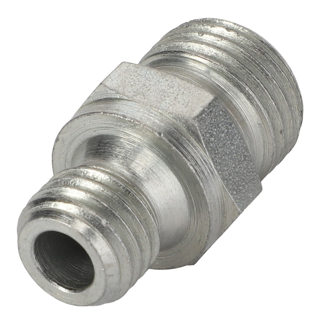 Close-up view of the AGCO Union - Acp0677100 metal hex nipple fitting with threaded ends, used for connecting pipes or hoses. No current product description available.