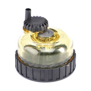 The AGCO Fuel Filter, Water Separator - V836862051 is a transparent, yellow plastic fuel filter with a black cap and base, featuring an inlet and outlet for fluid flow. Ideal for Massey Ferguson models, this genuine part also functions as a fuel-filter-water-separator to ensure optimal engine performance.