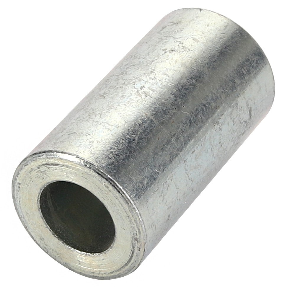 Introducing the AGCO | SPACER - CH215-6489: a cylindrical metal spacer with a hollow center, ideal for use in mechanical or assembly applications.