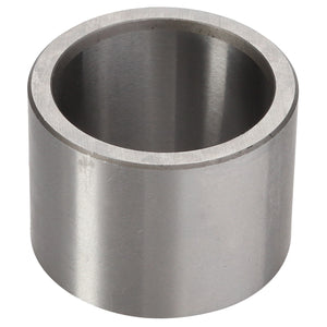 A sleek, cylindrical metal pipe segment with a hollow center and smooth surface, standing upright. Presenting the AGCO Spacer - Acp0445460 by AGCO.