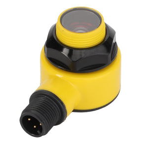 Introducing the AGCO | Tailing Return Sensor Emitter - Acx2438490 from AGCO: A yellow cylindrical electronic sensor equipped with a round lens on top and a black connector at the bottom featuring three pins. Currently, there is no detailed product description available.