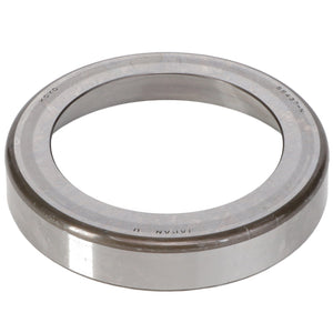 A metallic cylindrical AGCO Tapered Roller Bearing Cup - 808345 with inscriptions on its surface. No current product description available for this brand's product.