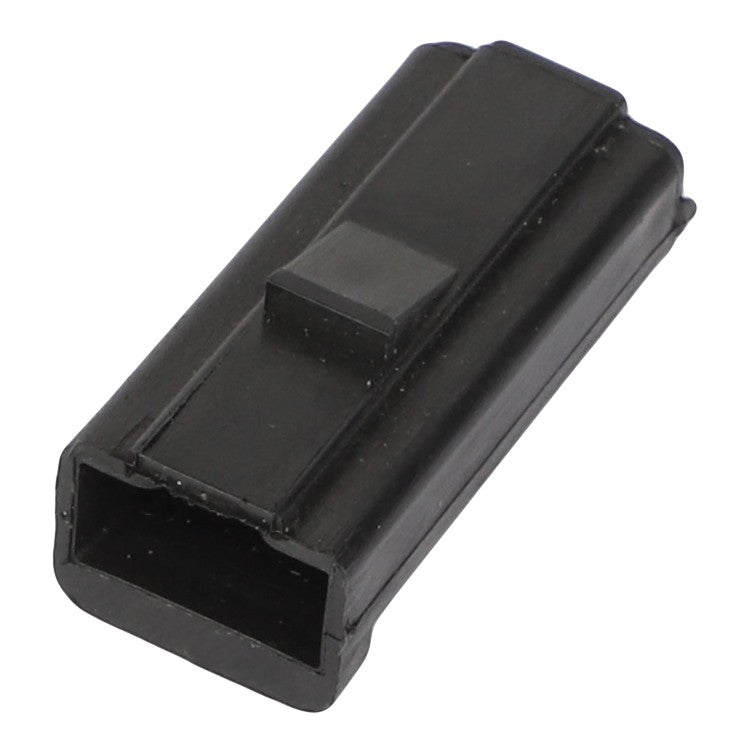 The AGCO | BODY CONNECTOR - AG515203 is a black plastic rectangular connector housing with an open end and a raised center ridge.