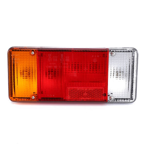 The AGCO Combination Light (AG516568) for the rear left side features three distinct sections: an amber indicator on the left, a red brake light in the middle, and a clear position light on the right, providing superior illumination. Engineered with durable quality, it is part of AGCO Genuine Lighting Parts.