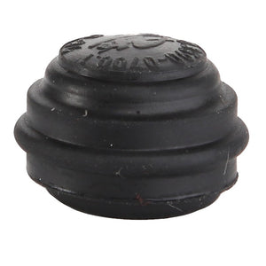 The AGCO | CAP - D45908600, a small, round black rubber device with ridges and embossed text on the top, comes without additional product information.