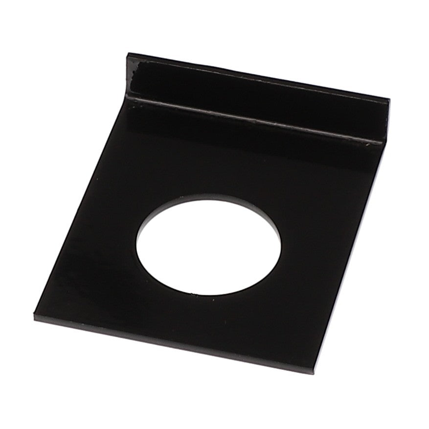 The AGCO RETAINER - E66728 is a black, rectangular metal plate featuring a circular hole in the center and a raised edge on one side.