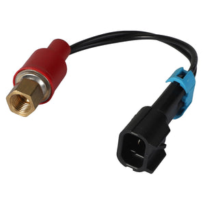 Close-up of the AGCO AIR CONDITIONING HIGH PRESSURE SWITCH - AG262906, highlighting its distinctive red housing, brass fitting, and an attached wire that leads to a black and blue electrical connector.